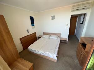 Ένα ή περισσότερα κρεβάτια σε δωμάτιο στο Family Hotel Lalov Egrek +50 φωτογραφίες