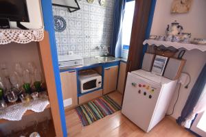 Kuchyňa alebo kuchynka v ubytovaní RNET - Mas Oliva Studio, piscina, terraza