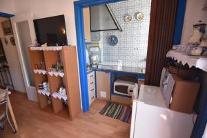 Kuchyňa alebo kuchynka v ubytovaní RNET - Mas Oliva Studio, piscina, terraza