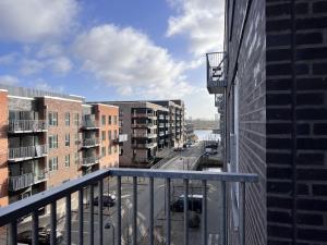 a view of a city street from a balcony at Cozy New Apartment In Popular Area 2 in Copenhagen