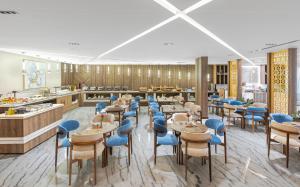 Restoran või mõni muu söögikoht majutusasutuses Seven Gardens Hotel