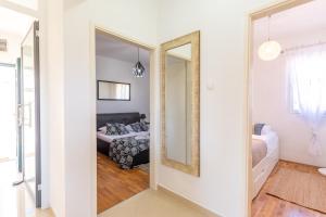 Posteľ alebo postele v izbe v ubytovaní Apartments Triporte