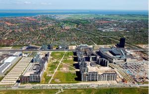 an aerial view of a city with buildings and the ocean at Three Bedroom Apartment In Copenhagen S, Cf Mllers Alle 56 in Copenhagen