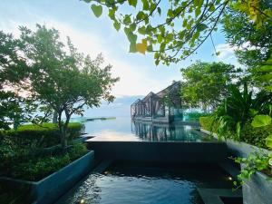 a view of a river with a bridge in the background at Edge Central Pattaya Vip Condo in Pattaya Central