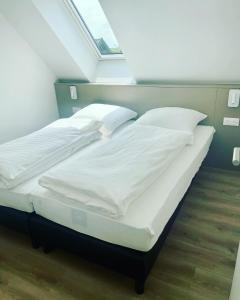 Кровать или кровати в номере La Clé des Vignes 2