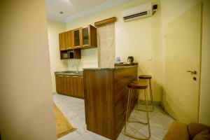 Dapur atau dapur kecil di Apartment 79 Hotel & Suite