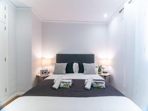 Posteľ alebo postele v izbe v ubytovaní MD Iturbi Jardin Turia