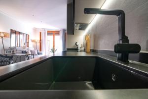 Kuchyňa alebo kuchynka v ubytovaní MD Iturbi Jardin Turia + 34 fotografií