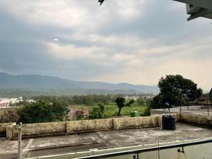 a view from the roof of a building at Daisy by Wabi Sabi Stays with Private balcony in Rishīkesh