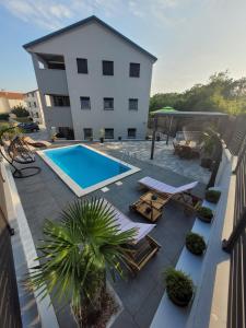 Der Swimmingpool an oder in der Nähe von Apartment Lo&Ti