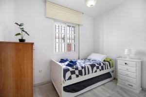 Posteľ alebo postele v izbe v ubytovaní Dúplex Chanca