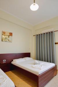 Cama o camas de una habitación en Hotel Milo Ksamil