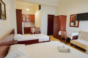 Cama o camas de una habitación en Hotel Milo Ksamil