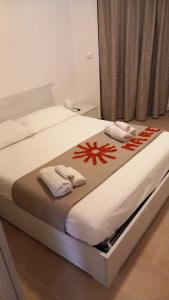 Posteľ alebo postele v izbe v ubytovaní CASA RELAX MARE Vasto