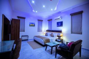 Televisyen dan/atau pusat hiburan di Apartment 79 Hotel & Suite