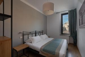 Voodi või voodid majutusasutuse Hotel dei Gonzaga, MantegnaHotels toas