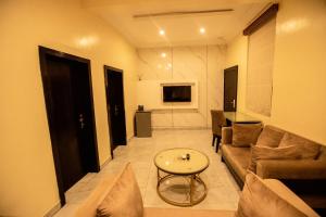 Ruang duduk di Apartment 79 Hotel & Suite