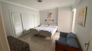 a living room with a bed and a couch at سابا باشا 3 in Alexandria