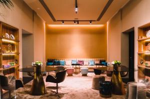 a lobby with two tables and a waiting room at Hotel Taburiente S.C.Tenerife in Santa Cruz de Tenerife