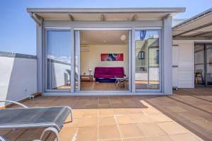 A seating area at Gregal Atico Roses - Immo Barneda