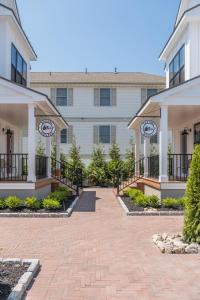 a courtyard in front of a building at The Hen Houses in Wildwood