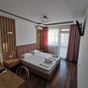 Postel nebo postele na pokoji v ubytování Villa Diana Self check-in