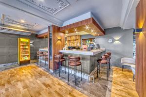 Kuchyň nebo kuchyňský kout v ubytování Numa Port Hotel