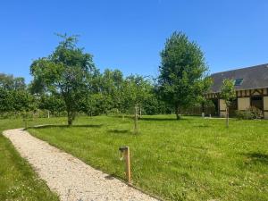 Zahrada ubytování Le Gîte du Verger au cœur des boucles de Seine