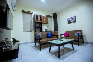 Televisyen dan/atau pusat hiburan di Apartment 79 Hotel & Suite