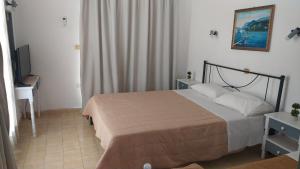 A bed or beds in a room at Nitsas studio's