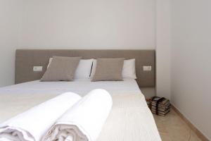 Ένα ή περισσότερα κρεβάτια σε δωμάτιο στο Cosy Flat Denia Beach +25 φωτογραφίες