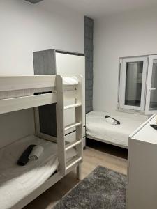 Katil atau katil-katil dalam bilik di APARTMA ANNA