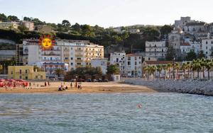 a view of a beach with people on the beach at Hotel Solaria in Rodi Garganico