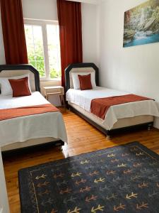 A bed or beds in a room at KAŞ MERKEZ İMREN APART 2