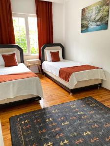A bed or beds in a room at KAŞ MERKEZ İMREN APART 2