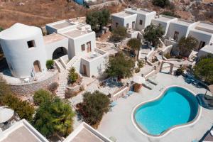 an aerial view of a resort with a swimming pool at XARAKI Traditional Houses in Chora Folegandros