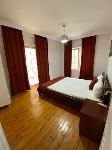 A bed or beds in a room at KAŞ MERKEZ İMREN APART 2 Még 1 kép