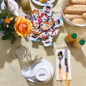a table with some food and a plate of food at BREAKFAST SA BETTUA in Càbras