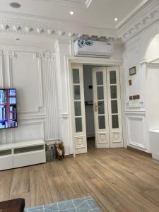 TV a/nebo společenská místnost v ubytování EVE HOME