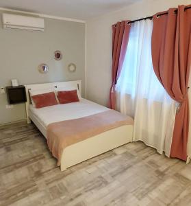 Postel nebo postele na pokoji v ubytování Pepi Residence