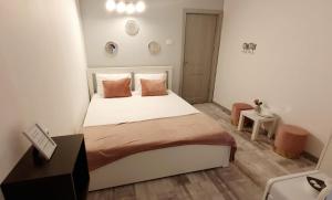 Postel nebo postele na pokoji v ubytování Pepi Residence