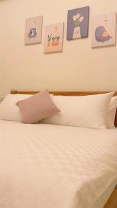 Cama o camas de una habitación en 聚一夏民宿