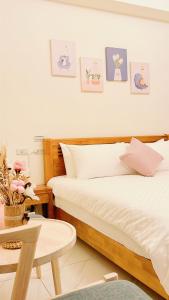 Cama o camas de una habitación en 聚一夏民宿