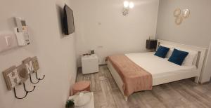 Postel nebo postele na pokoji v ubytování Pepi Residence