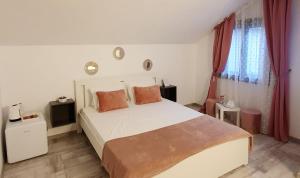 Postel nebo postele na pokoji v ubytování Pepi Residence