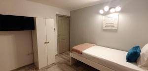 Postel nebo postele na pokoji v ubytování Pepi Residence