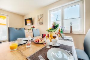 Nápoje v ubytování Ferienhaus Arisa III