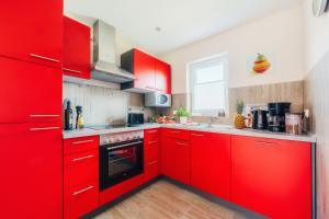 Kuchyň nebo kuchyňský kout v ubytování Ferienhaus Arisa III