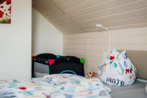 Postel nebo postele na pokoji v ubytování Ferienhaus Arisa III