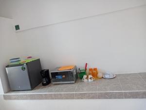Kuchyň nebo kuchyňský kout v ubytování Studio Martha